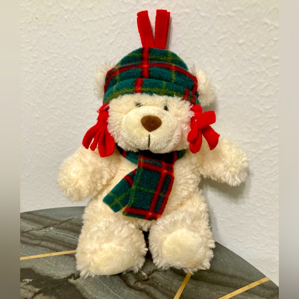 Soft toy Golden Bear with pigtails in a red-green hat and scarf 8 inches